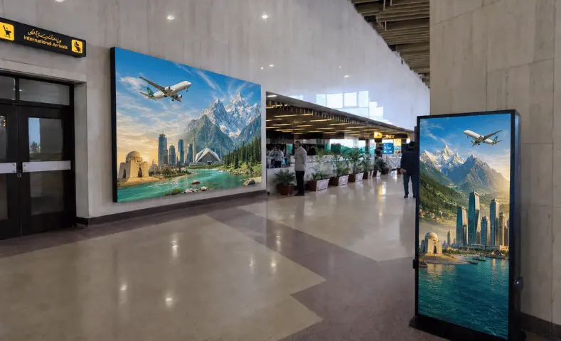 UPaisa on a JIAP corridor wall screen